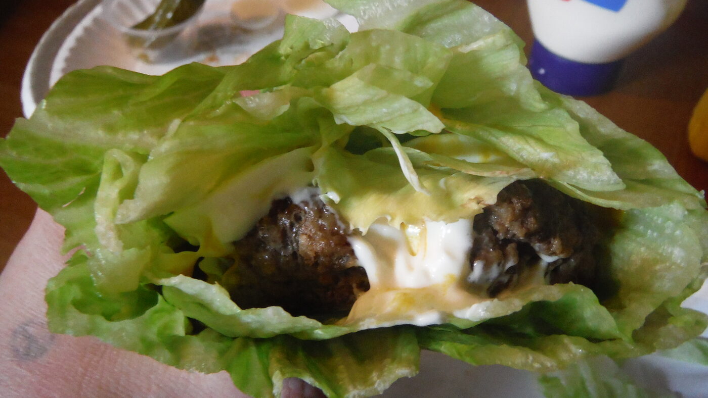 Burger with toppings wrapped in lettuce!